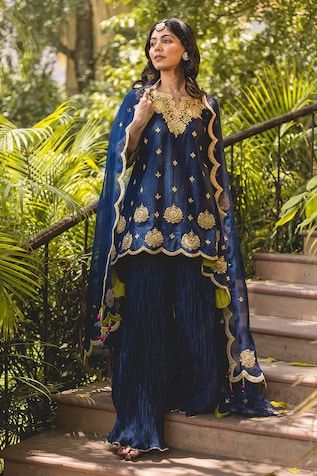 Navy blue banarasi chanderi kurta with marori and lace patchwork embroidery. Paired with scallop edge embroidered dupatta and crushed sharara. - Aza Fashions Designer Wear Banarasi Silk Palazzo Set, Designer Banarasi Silk Palazzo Set In Traditional Drape, Royal Blue Sharara With Zari Work, Festive Blue Sharara With Cutdana, Blue Cutdana Sharara For Festive Occasions, Designer Blue Dola Silk Palazzo Set, Designer Banarasi Silk Palazzo Set With Cutdana, Designer Banarasi Silk Palazzo Set For Navratri, Blue Palazzo Set With Dupatta For Wedding