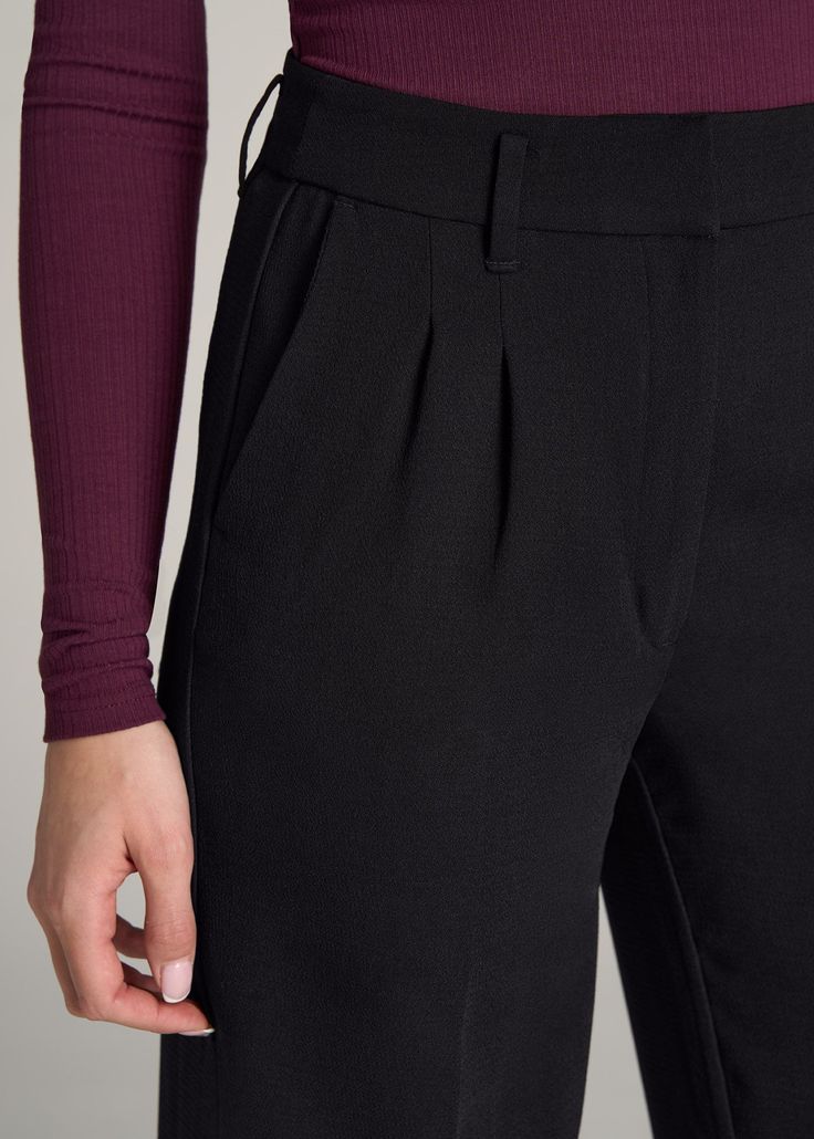 About Our Extra-Long Women’s Dress Pants Make a statement in these stylish pleated women’s tall dress pants. Pleated trousers are a timeless trend you’ll love and now, there’s finally a pair that will accentuate your long legs. These pants for tall women have been designed specifically for ladies between 5’9” and 6’6”, with a full length offering extra-long inseam options. They have a high-rise silhouette that gives the appearance of a cinched waist, complete with a fly zipper and hook and bar c Black Pleated Bottoms For Workwear, Black Pleated Pants For Work, Fall Black Bottoms With Pleated Waist, Black Pleated Straight Leg Pants, Black Straight Leg Pleated Pants, Black Pleated Straight-leg Pants, Black Straight-leg Pleated Pants, Chic Bottoms With Pleated Waist For Fall, Pleated Skirt Bottoms For Fall Date Night