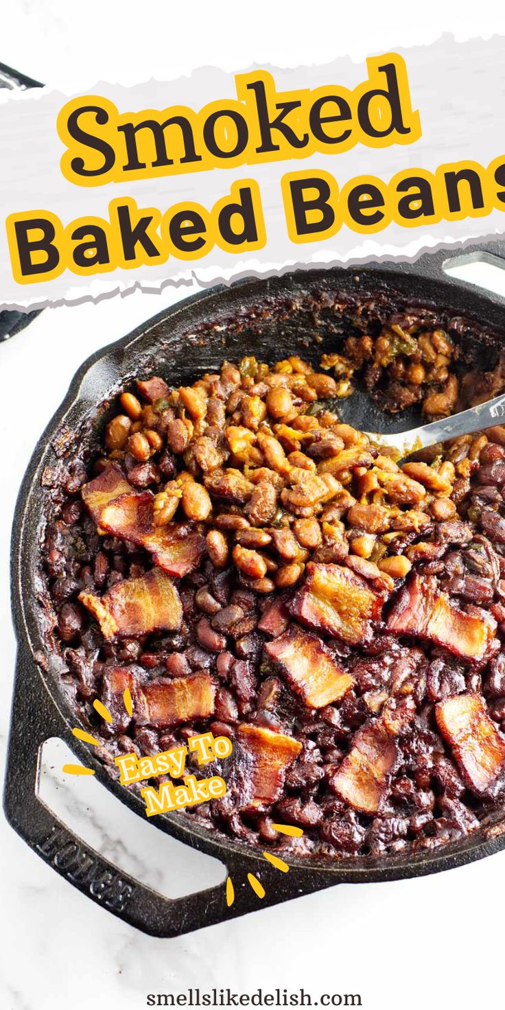 a skillet filled with baked beans on top of a white counter next to a sign that says smoked baked beans