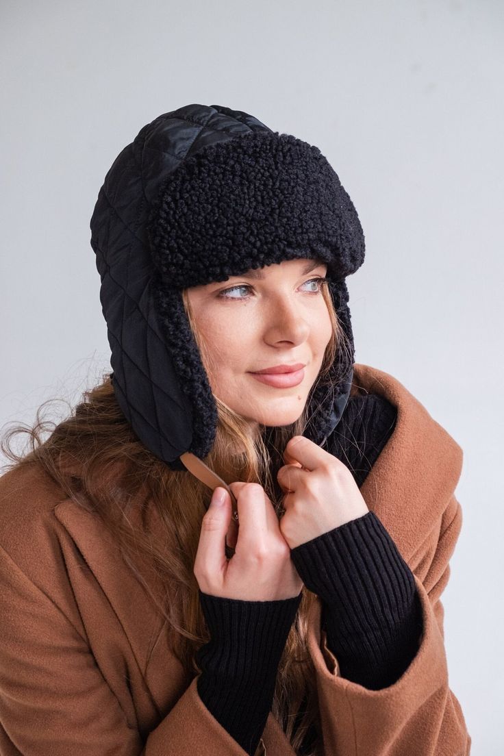 Our waterproof Trapper hat is essential for protecting your head and face from the elements. Whether it's rain, snow, or sleet, a waterproof hat will keep you dry and comfortable. Outside material is woterproof quilted fabric, inside is faux fur. It is made in one universal size and fits for 55-58cm around head mesurements. Luxury Warm Hat For Cold Weather, Hats Fir Winter, 2022 Winter Hat, Barts Hats Winter, Womens Winter Hats 2022, Luxury Winter Outdoor Hats, Winter Hats With Ear Flaps In Fabric, Winter Work Hat, Stocking Hats For Women Winter