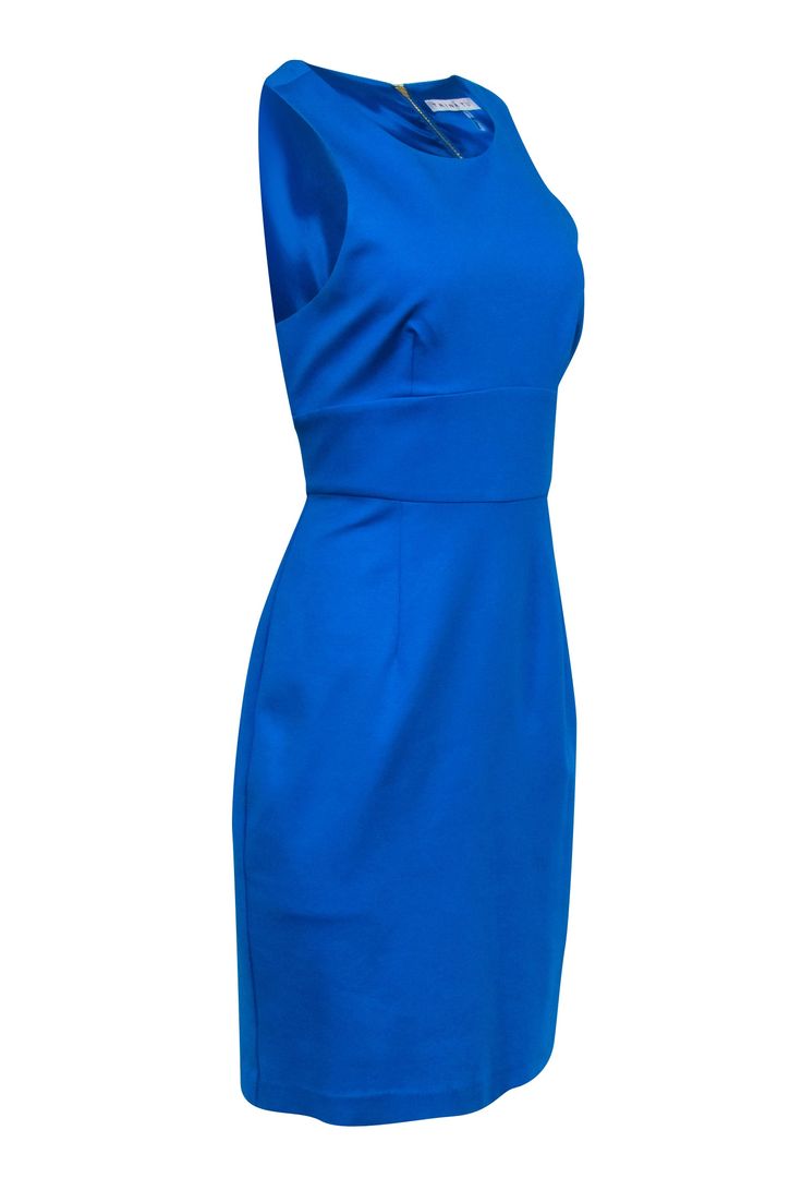 This Trina Turk dress is the perfect companion for a day that starts in the office and ends at happy hour! The Caribbean blue color makes the saucy sleeveless sheath style sizzle, and you'll be able to transition smoothly, no outfit change needed, from one event to the next! Size 10 Shell 69% Rayon, 29% Nylon, 2% Spandex Lining 100% Polyester Exposed gold back zipper Sleeveless Racer back Bust 40" Waist 32" Shoulder to hem Blue Stretch Sheath Sleeveless Dress, Blue Sleeveless Dress For Work, Sleeveless Blue Workwear Dress, Blue Sleeveless Workwear Dress, Blue Fitted Sheath Sleeveless Dress, Blue Fitted Sleeveless Sheath Dress, Blue Fitted Sleeveless Formal Dress, Formal Fitted Blue Sleeveless Dress, Blue Bodycon Sheath Sleeveless Dress