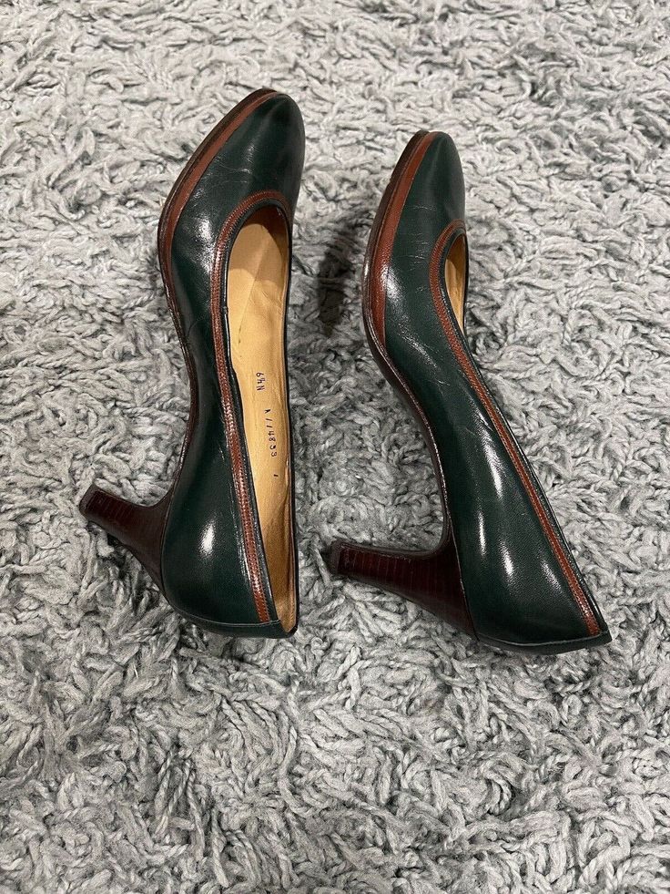 Classic: BALLY of Switzerland all Leather.Dark Green/ Brown/Black Luxury Quality Premium Quality Soft Leather molds to your foot and delivers greatest comfort. These heels are a classic design forever style. Preloved and in great condition If you wear 2 3/4" Heels in 6.5N these are a great choice for your collection. Styles well with Black or brown Vintage Made in Switzerland Smoke free home Classic Green High Heels, Heeled Pumps, Womens Pumps, Black Luxury, Feb 7, Green Brown, Green And Brown, Women's Pumps, Pumps Heels