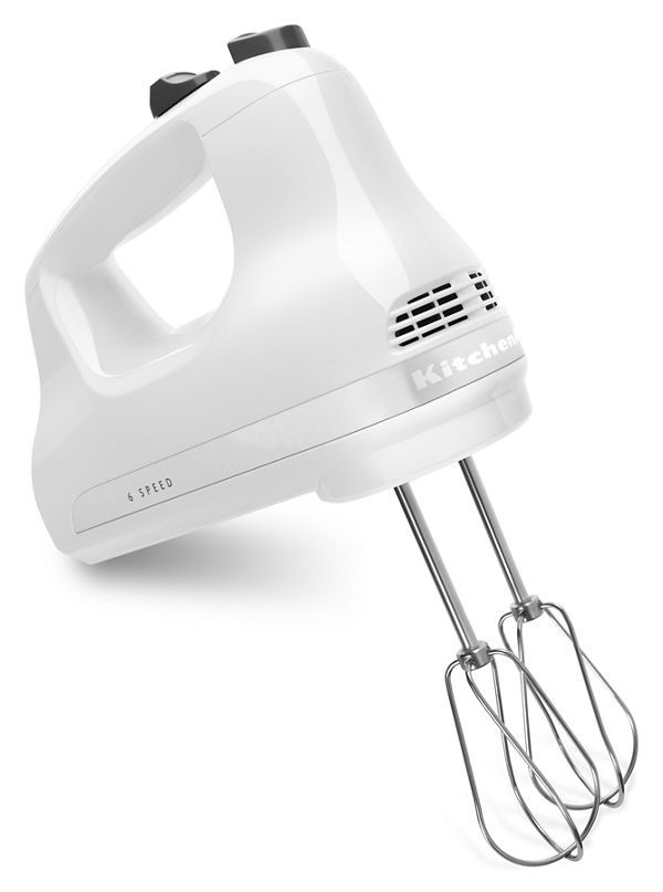 an electric hand mixer and whisk attachment on a white background