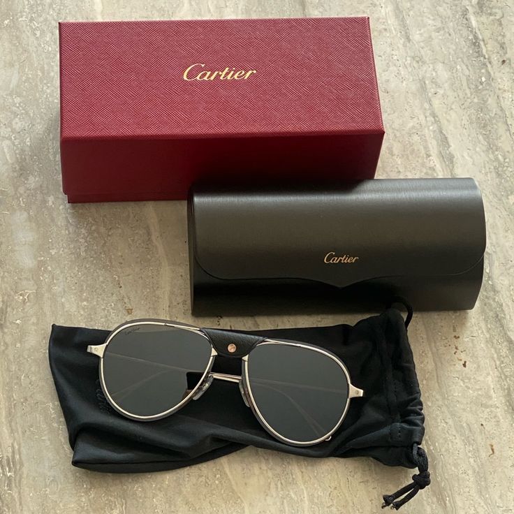 New With Packaging Cartier Men’s Sunglasses. Metal Titanium Material With A Brushed Ruthenium Finish, Gray Polarized Lenses. Ruthenium Finish, Aviator Shape. Black Calfskin Bridge *Please Note: Model Pic Is In Different Color Than What It For Sale But Same Look Classic Cartier Sunglasses With Tinted Lenses, Classic Cartier Sunglasses With Mirrored Lenses, Classic Cartier Tinted Sunglasses, Formal Cartier Sunglasses With Gradient Lenses, Classic Cartier Sunglasses For Formal Occasions, Elegant Aviator Sunglasses With Metal Frame For Formal Occasions, Classic Formal Sunglasses With Metal Frame, Classic Anti-reflective Sunglasses For Formal Occasions, Silver Sunglasses With Gradient Lenses For Formal Events