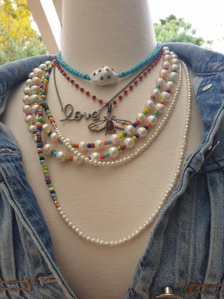 "Bright, vibrant beads make this necklace perfect addition to your summer sundress or a white blouse. African glass beads and 4mm white freshwater pearls are beaded to create a color block strand. You can wear this necklace single, double or even triple! Alone or layered with your favorites, this necklace exudes a playful, eclectic bohemian elegance. Necklace: 49\" plus extender Layer this necklace with: https://www.etsy.com/listing/637252353/baroque-pearl-and-turquoise-necklace?ref=shop_home_ac Pearl Necklaces With Spacer Beads For Beach, Beach Pearl Beaded Necklaces With Spacer Beads, Pearl Beaded Necklaces With Spacer Beads For Beach, Summer White Beaded Necklaces With Spacer Beads, White Beaded Necklace With Colorful Beads For Vacation, Handmade White Strand Beaded Necklaces, White Beaded Necklaces With Round Beads For Vacation, White Beaded Strand Necklace, Handmade White Beaded Strand Necklace