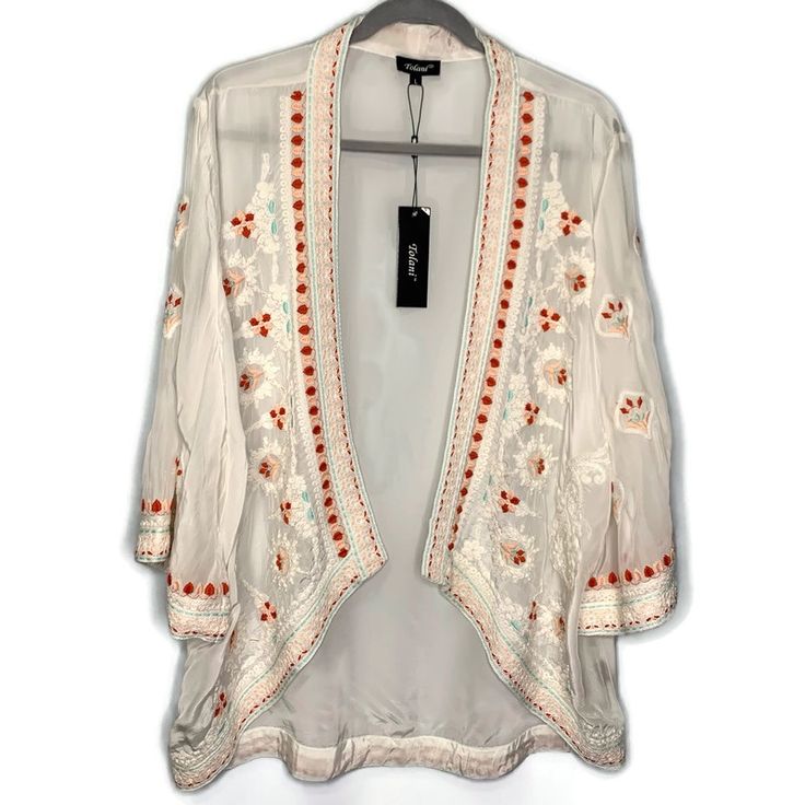 Tolani White Embroidered Open Front Karma Kimono Jacket Size: L Brand New With Tags! Retail Price $173 Please Zoom In Photos For Best View. Open Front. Stunning Embroidery. 100% Viscose. Hand Wash/Dry Clean. Measurements (Laid Flat Unstretched) Chest (Under Arm To Under Arm) 23”Flat Across Waist: 23”Flat Across Sleeve Length: 18” Sleeve Width: 8.5”Flat Across Bicep Total Length (Top Shoulder To Hem) Front 27”, Back Length 30.5” Back (Shoulder Blade Seam To Shoulder Blade Seam) 16.5” Flat Across Festive White Outerwear With Chikankari Embroidery, Fitted White Bohemian Outerwear, White Fitted Bohemian Outerwear, White Bohemian Embroidered Outerwear, Fitted White Outerwear For Festival, White Bohemian Outerwear With Intricate Embroidery, Festive Long Sleeve Outerwear For Spring, Fitted Long Sleeve Embroidered Kimono, Long Sleeve White Outerwear For Festival