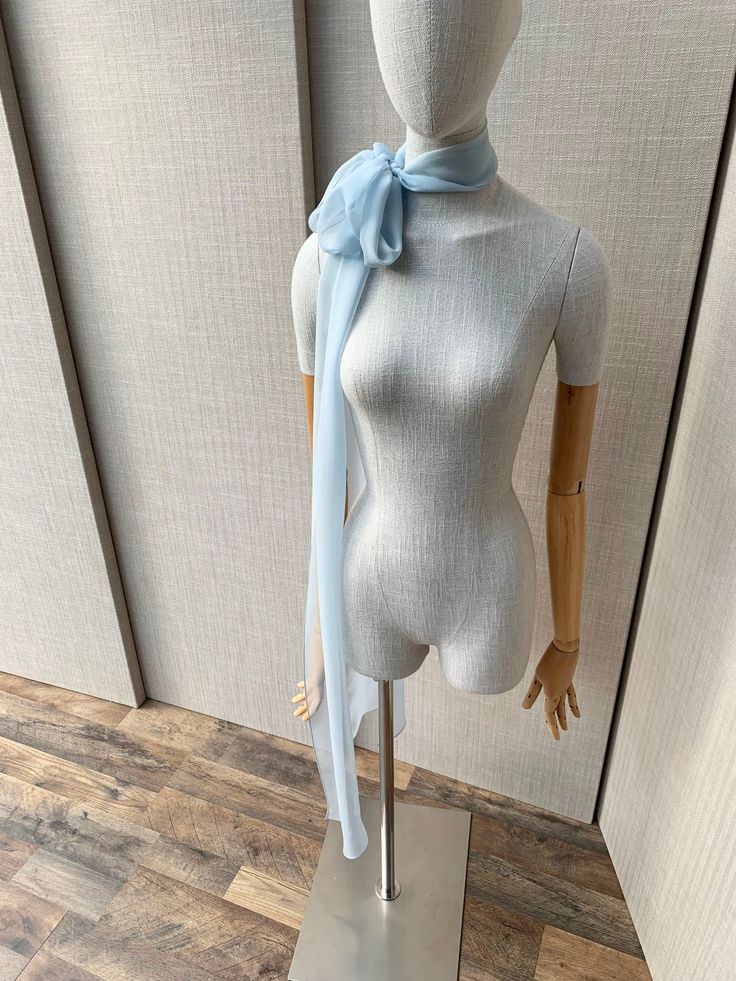 This elegant stylish silk scarf is so fun and versatile. Beautifully hand-made with fine silk chiffon that feels so delicate and soft to the touch. You can also tie the scarf into a bow  around your ponytail or use it as a sash. The length of the scarf in the photos measures 115" long. Shown in powder blue chiffon.  * RETURN POLICY - We do not accept returns for a refund as all of out items are made to order. But please contact us if you are having an issue with your order. - We do accept exchanges. You can exchange your items for something else in our shop. The items you would like to exchange should be shipped back in the original condition within 7 days of the delivery. The buyer is responsible for the cost of postage for the returning items. Elegant Silk Chiffon Scarves For Summer, Elegant Silk Scarf For Summer Weddings, Chic Silk Scarf For Summer Weddings, Chic Silk Scarf For Wedding In Summer, Chic Summer Wedding Scarves, Blue Silk Scarf For Wedding, Elegant Blue Scarves For Wedding, Elegant Blue Scarf For Wedding, Elegant Spring Wedding Scarves