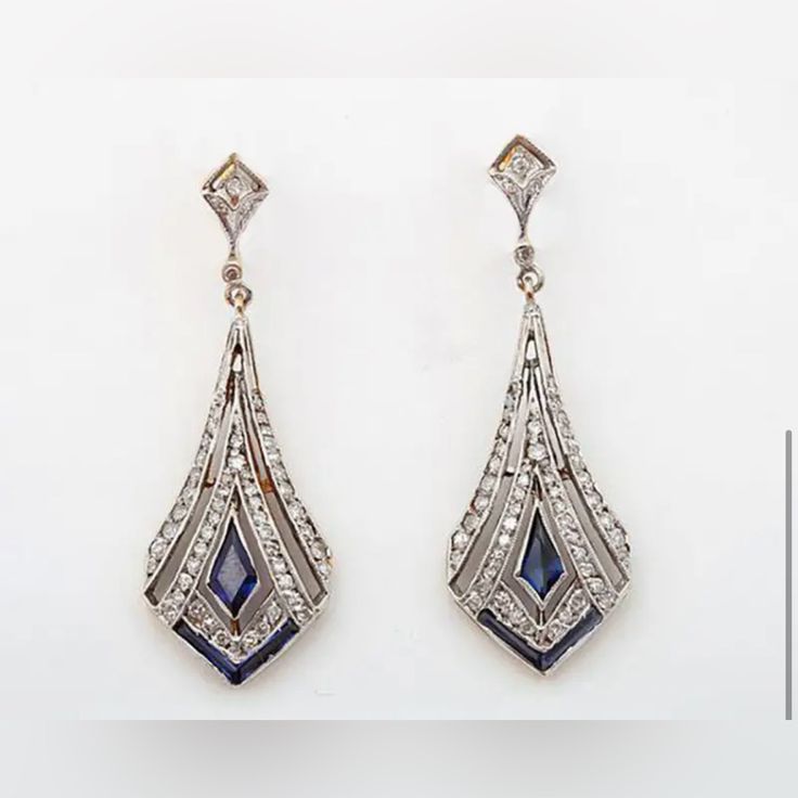 Beautiful Antique Style Earrings. Blue Accent And Zircon Inlays. Alloy. Dangling. For Pierced Ears. See Photos For Dimensions. Ae20 Blue Art Deco Wedding Earrings, Blue Sterling Silver Drop Diamond Earrings, Sterling Silver Blue Diamond Drop Earrings, Formal Blue Diamond Earrings For Pierced Ears, Formal Blue Diamond Earrings, Blue Sterling Silver Earrings For Evening, Art Deco Blue Drop Earrings, Blue Art Deco Drop Earrings, Blue Art Deco Jewelry For Party