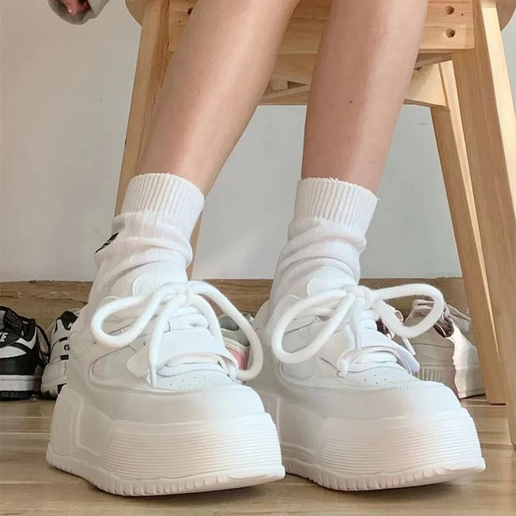 🌟 Elevate Your Stride: White Platform Chunky Sneakers 👟 Step into Bold Comfort: Make a stylish statement with White Platform Chunky Sneakers, designed for those who appreciate the fusion of bold fashion and unbeatable comfort. These sneakers are a must-have for elevating your casual look with a touch of contemporary flair. ✨ Superior Comfort and Trendy Design: Meticulously crafted for top-notch quality, these chunky sneakers offer exceptional comfort and a trendy, contemporary aesthetic. Wheth Chunky Platform Lace-up Sneakers For Sports, Chunky Lace-up Sneakers For Sports, White Chunky Platform Lace-up Sneakers, Chunky Platform Lace-up Wedge Sneakers For Streetwear, Chunky Platform Lace-up Sneakers For Streetwear, Streetwear Chunky Platform Lace-up Wedge Sneakers, Lace-up Chunky Platform Sneakers For Streetwear, White Lace-up Wedge Sneakers For Streetwear, White Comfortable Platform Sneakers With Thick Bottom