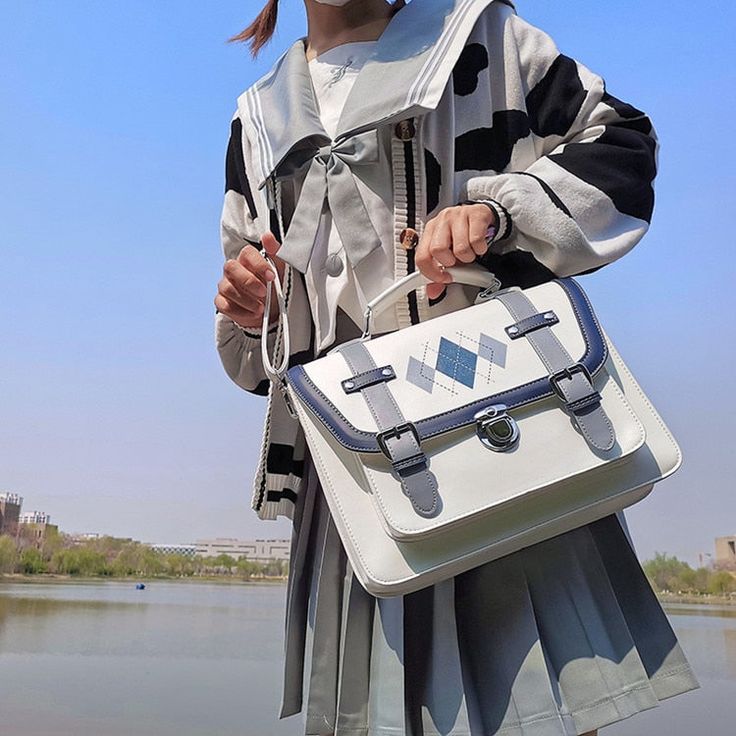 Brand Name: TuTu BlosaPlace Of Origin: ZHE JIANG ProvinceOrigin: CN(Origin)Main Material: PUCapacity: 20-35 LitreItem Type: BackpacksStyle: Preppy StyleClosure Type: HaspTechnics: EmbossingExterior: Open PocketRain Cover: NoGender: WOMENCarrying System: Arcuate Shoulder StrapLining Material: Synthetic LeatherModel Number: H228Pattern Type: panelledBackpacks Type: SoftbackInterior: Interior Slot PocketInterior: Cell Phone PocketInterior: Interior Zipper PocketHandle/Strap Type: Soft Handle Kawaii Bags For Students, Trendy Square Backpack For Students, Rectangular Large Capacity Chest Bag For School, Harajuku Style Large Capacity White Shoulder Bag, White Harajuku Shoulder Bag With Large Capacity, White Harajuku Style Shoulder Bag With Large Capacity, White Harajuku Style Shoulder Bag, Kawaii Portable Bags For Students, White Harajuku Backpack For Back To School