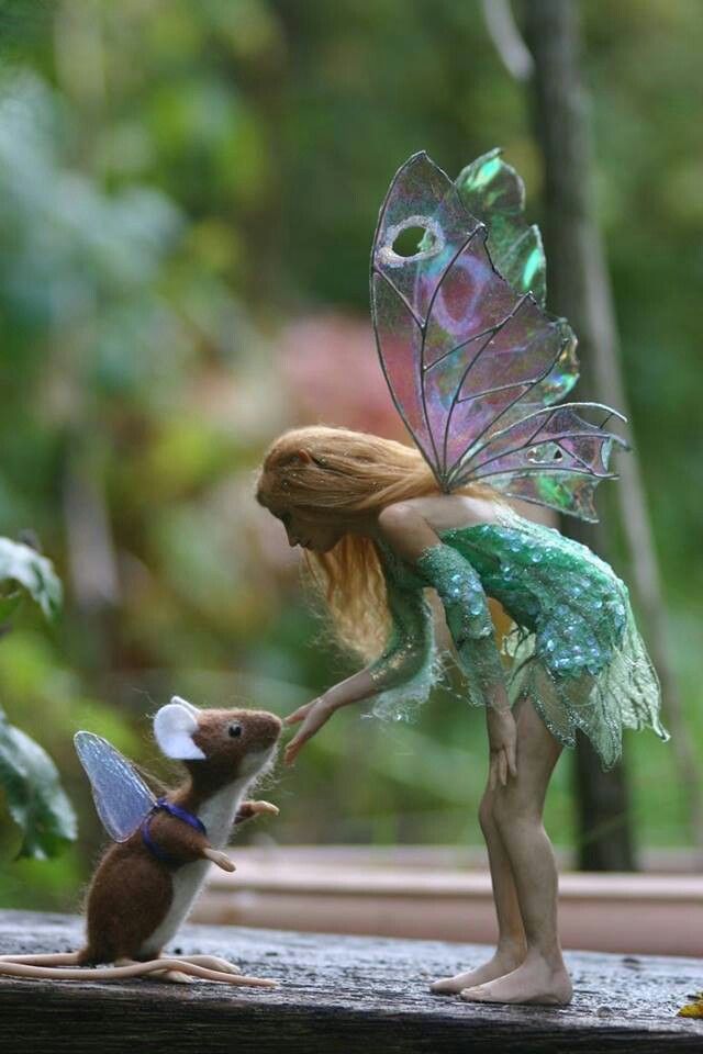 a little fairy with a mouse in her hand and a quote from the book, always choose kindness and love over fear