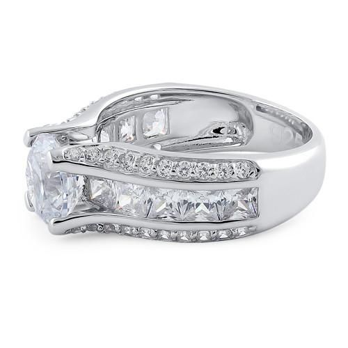 Top of ring height: 8mm

Top of ring width: 8.8mm

Band width: 7.5mm

Shank width: 4.7mm


Stone material: clear cubic zirconia

Center stone size: 8mm

Stone shape: round & princess cut

Center stone carat weight: 2.04 ct.

Total number of CZ stones: 51

Stone setting: prong setting


Metal: 925 sterling silver

Plating: rhodium plated

Finish: high polish Fine Jewelry With Cubic Zirconia And Side Stones, Cubic Zirconia Asscher Cut Ring With Accent Stones, Cubic Zirconia Diamond Ring With Side Stones For Promise, Promise Diamond Ring With Side Stones In Cubic Zirconia, Promise Rings With Side Stones In Cubic Zirconia, Asscher Cut Cubic Zirconia Rings With Accent Stones, Radiant Cut Ring With Channel Set Cubic Zirconia, Princess Cut Rings With Side Stones For Promise, Princess Cut Promise Ring With Side Stones