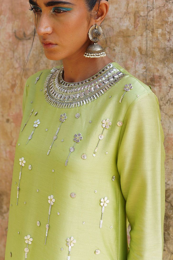 Editor's Note Featuring a green Hand Embroidered Kurta Set in Chanderi. Color: Green Fabric: Chanderi Care: Dry Clean Only About the Designer Modernizing Indian wear with rich handwoven textiles, fresh intricate textures, chic and classic silhouettes, Saksham & Neharicka handcraft all designs to eternal perfection. Their soulful stories are inspired by nature, mythology and popular culture. Embroidery Quotes, Hoops Embroidery, Indian Outfits Modern, Cotton Night Dress, Flower Machine Embroidery Designs, Kurta Set For Women, A Line Kurta, Embroidery Neck Designs, Beautiful Dress Designs