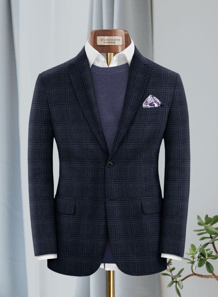 Elusive jackets are ideal for making an impact and our Lanificio  Zegna Trofeo Blue Checks Cashmere Jacket is one of them, as it exhibits a sophisticated silhouette. Crafted from a blend of wool and cashmere, the jacket with a checked pattern will add a touch of sophistication to your look, while a requisite blue hue is ideal for showcasing a dedication to excellent manner and modern fashion. 
 
 Look Includes  Lanificio Zegna Trofeo Blue Checks Cashmere Fabric  Two Button Jacket Style  Notch La Tailored Long Sleeve Sport Coat For Semi-formal Occasions, Luxury Long Sleeve Blazer With Welt Pockets, Luxury Navy Sport Coat For Business Casual, Long Sleeve Sport Coat With Welt Pockets For Business, Luxury Navy Single-breasted Blazer, Navy Blazer With Welt Pockets, Luxury Outerwear With Welt Pockets For Business Meetings, Timeless Blue Long Sleeve Sport Coat, Wool Long Sleeve Sport Coat For Business Meetings