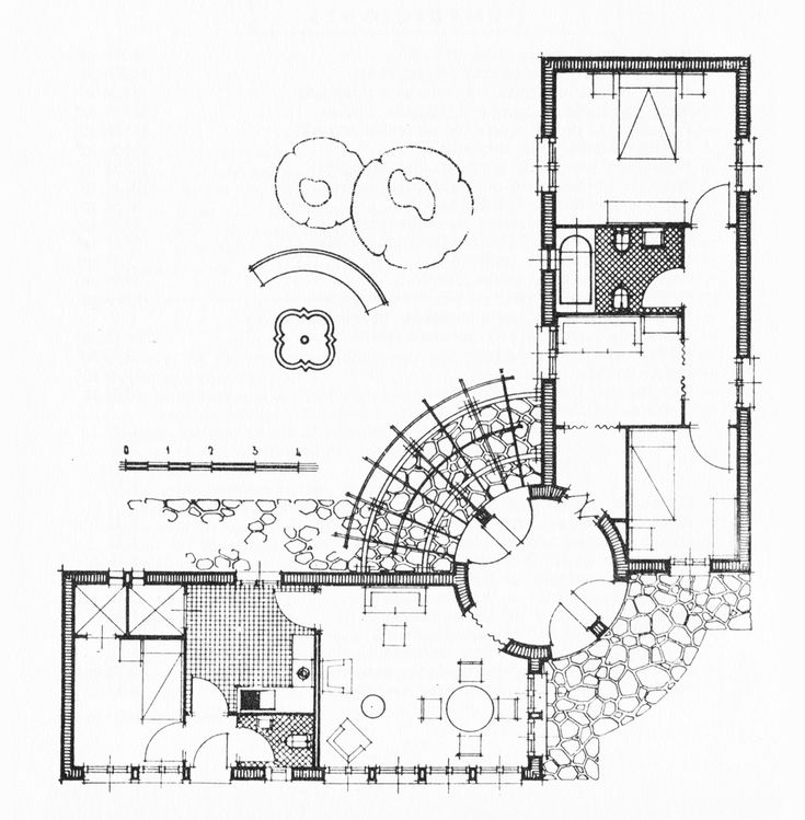 an architectural drawing shows the plan for a house with spiral staircases and circular balconies