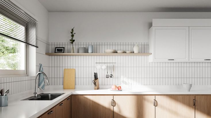 a kitchen with wooden cabinets and white counter tops, along with a window over the sink