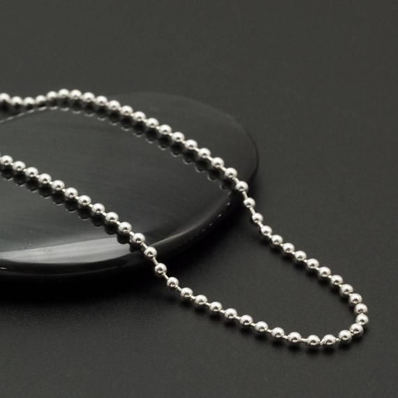 It has a smooth feel, is made from sterling silver, measures 1.8mm thick and is Made in the USA. We love that! https://www.etsy.com/listing/541575964/sterling-silver-bead-chain-18mm-by-the?ref=rss Silver Chain Necklace With Round Beads And Adjustable Chain, Silver Jewelry With Box Chain And Round Beads, Silver Necklace With Box Chain And Round Beads, White Gold Ball Chain Necklace As Gift, Special Necklace, Split Rings, Bead Chain, Silver Bead, Jewelry Tools