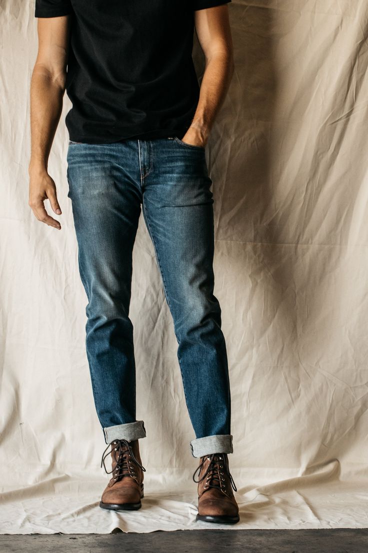 Slim fit Indigo Washed 10.5 oz What is denim weights? 96% COTTON/4% POLYURETHANE 4-Way stretch selvedge denim Made in USA Model is 6'2" and wearing a size 32. Our premium denim is inspired by the classic vintage blue jean. Our Premium Japanese 4-Way Stretch Selvedge denim story starts in Japan where our fabric is developed at one of the oldest denim mills. We blend a unique 4 way stretch material with selvedge denim to create a specific amount of stretch and comfort you wouldn’t typically get wi Dark Wash Selvedge Tapered Leg Jeans, Classic Dark Wash Pre-washed Bottoms, Medium Wash Straight Leg Selvedge Jeans, Medium Wash Selvedge Straight Leg Jeans, Dark Wash Selvedge Jeans With Straight Hem, Rugged Fitted Straight Leg Jeans, Dark Wash Pre-washed Jeans For Fall, Dark Wash Mid-rise Selvedge Jeans, Rugged Medium Wash Bottoms With Standard Cut Leg