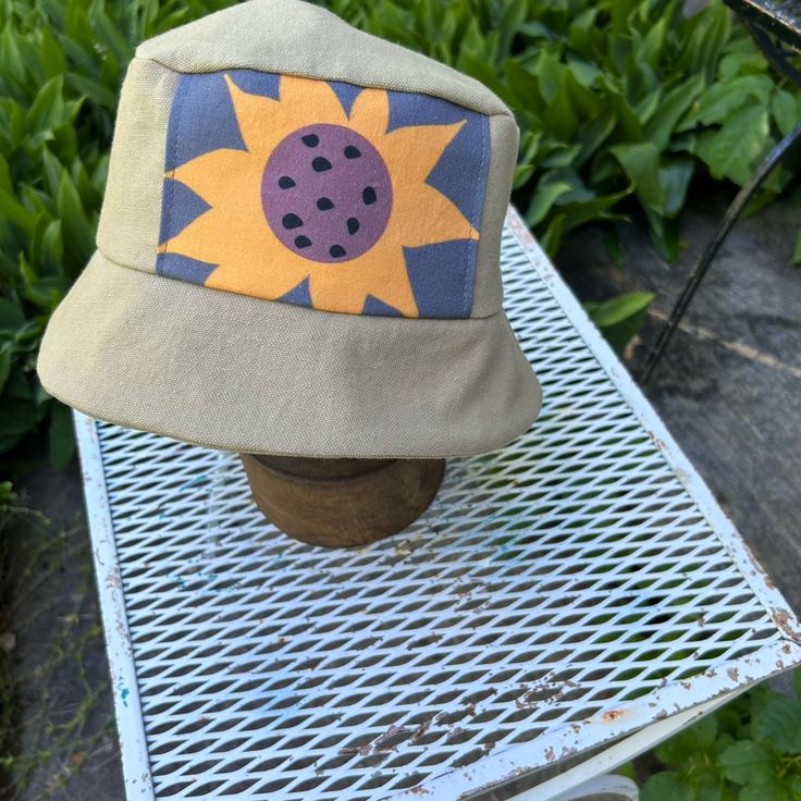 Cute Hat For Summer Made Of Cotton Duck, Never Worn. Original Sunflower Art Applique.Adult Size 22”- 23”. Whimsical Brimmed Sun Hat For Summer, Multicolor Wide Brim Sun Hat For Garden Party, Adjustable Green Sun Hat, Whimsical Adjustable Sun Hat For Summer, Whimsical Curved Brim Sun Hat For Beach, Whimsical Bucket Hat For The Beach, Whimsical Brimmed Sun Hat For Beach, Adjustable Yellow Hats For Garden Party, Whimsical Bucket Sun Hat