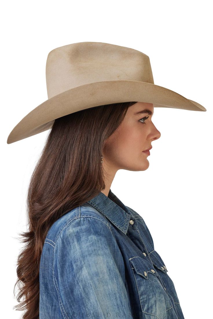 WELL-LOVED AND RANCH-READY! While not actually worn, that’s the vibe we wanted to give to the Walker’s Hat. The classic cowboy silhouette features a pinched front crown and slightly upturned brim, accented by a slim leather hatband and custom concho, and shaped and aged by hand to appear as if it’s spent hours on the cattle drive. An instant classic! color: silver belly size: s,m,l brim 4" crown in front 4", crown in back 5 1/2" style number: Hat-108 collection: Walker Pre-order - SUMMER 2023 DE Cowboy Silhouette, Cattle Drive, Classic Cowboy, Collar Tips, Cashmere Accessories, Stocking Gifts, Jewelry Pins, Silver Accessories, The Vibe