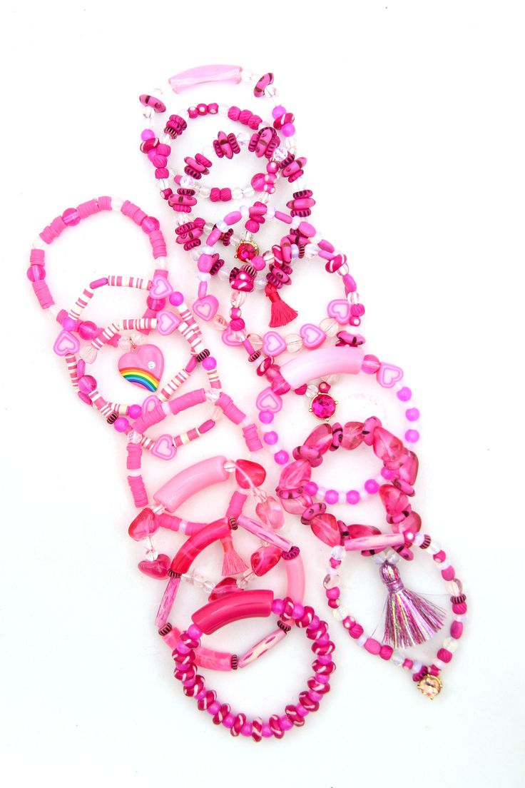 Pink Themed Adjustable Charm Bracelet, Pink Adjustable Themed Charm Bracelet, Adjustable Pink Themed Charm Bracelet, Pink Adjustable Themed Beaded Bracelets, Pink Themed Adjustable Beaded Bracelets, Adjustable Pink Themed Beaded Bracelets, Pink Novelty Plastic Bracelets, Pink Plastic Novelty Bracelets, Trendy Pink Plastic Bracelets