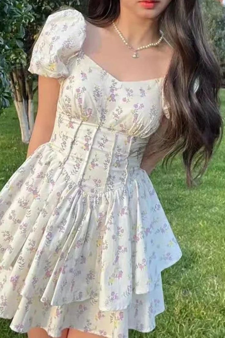 Cute Ditsy Floral Print Dress For Day Out, Cute Ditsy Floral Dress For Day Out, Cute Flowy Floral Dress, White V-neck Dress For Picnic, Cute Flowy Floral Dress For Spring, Cute Floral Dress For Garden Party, White Floral Patchwork Dress For Vacation, Cute Flowy Spring Dresses, Cute Cream Mini Length Dresses