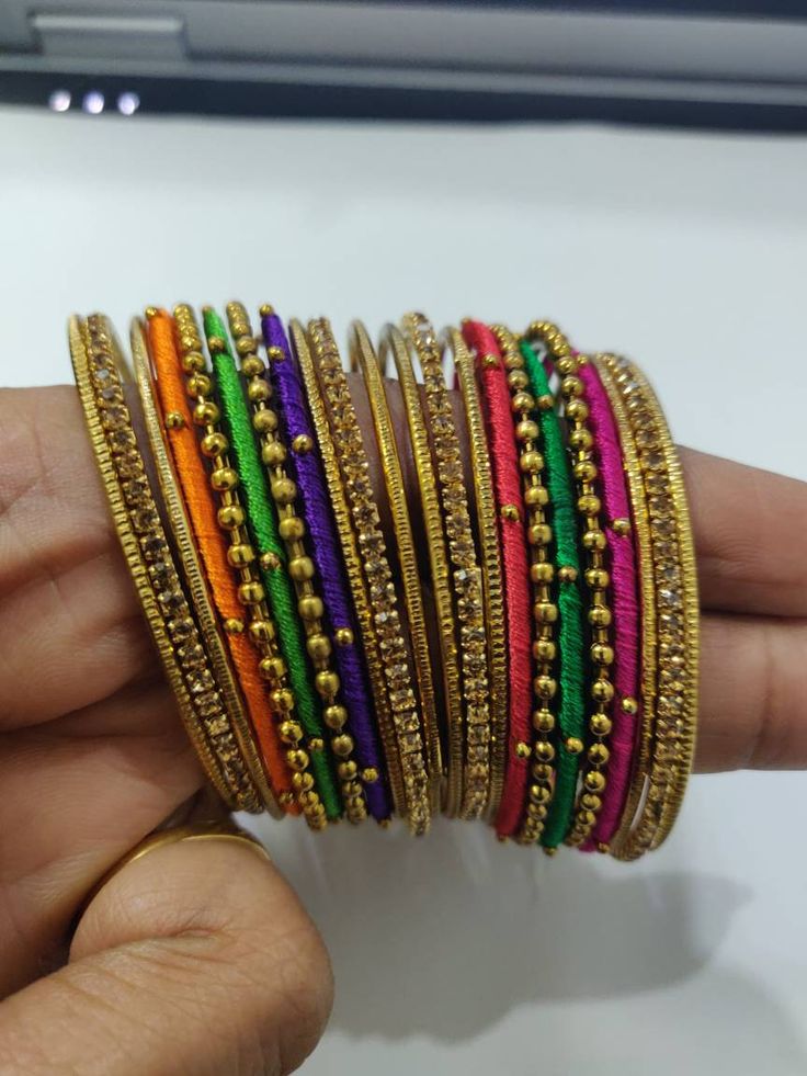 Welcome to our shop We bring to you very ethnic products from core of India almost every thing is handmade or custom made Set of 22 Bangles in multiple colors Size 2.4 We will be happy to serve you Multi Colour Bangle Set, Multi Colour Bangles, Traditional Colorful Jewelry For Festivals, Multicolor Round Beads Bracelets For Weddings, Adjustable Multicolor Bangle For Diwali, Multicolor Beaded Bangle For Wedding, Adjustable Multicolor Bracelets For Diwali, Traditional Adjustable Multicolor Bangle, Pink Handmade Bracelet For Diwali