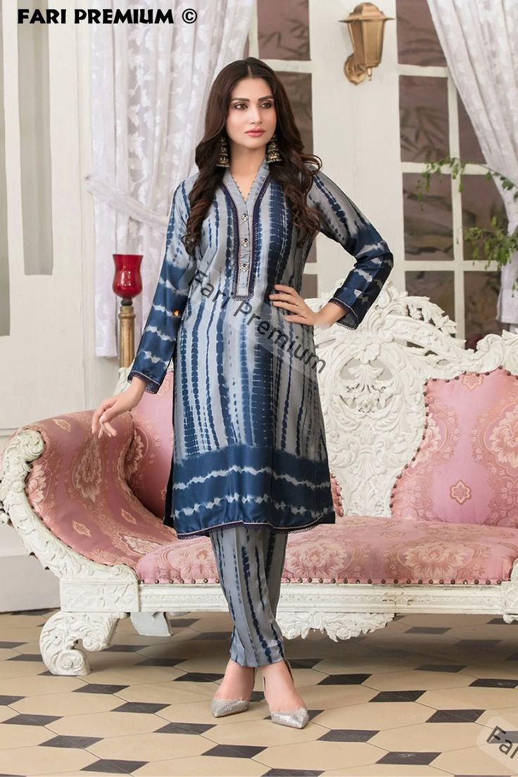 "Last Outfit Left in Medium 42 Bust-Round    Ready to Ship (USA) - Free Shipping  BRAND NEW Stitched, Ready-Made,  Embellished, Tie & Dye Printed,  2-Piece Silk Shalwar Kameez 2 Piece Suit  READY-MADE / STITCHED / READY TO WEAR Two Piece Includes: 1. Shirt: Full-sleeve silk kameez with printed tie & dye design on full front & back. A beautiful neck design halfway down with stone buttons, lace, and pearl embellishment. Lace is also designed on front daaman and sleeve cuffs. 2. Shalwar/Bottom: Sil Fitted Blue Lawn Suit For Navratri, Tie And Dye Suits Indian, Blue Unstitched Suit For Eid, Blue Lawn Suit With Pallu For Eid, Blue Cambric Sets For Festivals, Indigo Straight Kurta Set With Dabka, Blue Traditional Wear With Printed Motifs And Long Sleeves, Indigo Dabka Straight Kurta Sets, Fitted Blue Traditional Wear With Printed Motifs