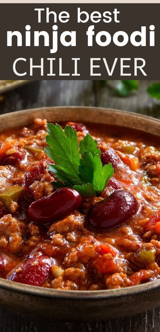 the best ninja food chili ever is in a bowl with olives and peppers on top