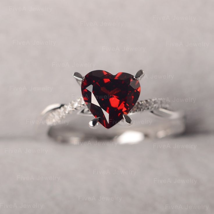 ◆ The ring is handcrafted from sterling silver and decorated with a dazzling 8*8 mm Garnet and CZs. It is suitable for engagement/anniversary/daily occasion. ◆ Production Description: Main stone Type: Garnet Main Stone Shape: Heart Cut Main Stone Size: 8*8 mm(2.44ct) Side stone: CZ Metal: 925 Sterling silver - Other options available in the drop down menu ◆ Customization: √Free for Add Engraving √Other Metal Type Available √Other Gemstones & Shapes Available √Personalization Requests Availab Moissanite Heart Cut Diamond Ring For Proposal, Heart Cut Moissanite Diamond Ring For Proposal, Diamond White Promise Jewelry For Valentine's Day, Diamond Heart Cut Ring For Proposal, Anniversary Ruby Ring With Moissanite In Round Cut, Anniversary Ruby Ring With Round Cut Moissanite, Valentine's Day Solitaire Diamond Jewelry, Luxury Diamond Ring With Gemstone For Valentine's Day, Heart-shaped White Gold Birthstone Ring For Valentine's Day