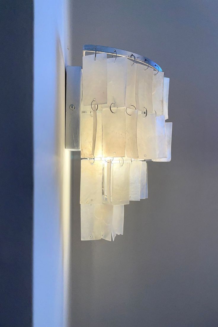 a light that is hanging from the side of a wall