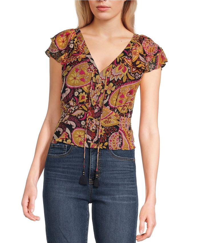 From Jessica Simpson&#x2C; this blouse features:Floral printV-necklineShort flutter sleevesPullover stylingSquare hemPolyesterMachine wash/tumble dryImported. Patterned V-neck Rayon Tops, Floral Print Rayon V-neck Top, Fitted V-neck Rayon Top, Chic Patterned V-neck Top, Printed V-neck Rayon Tops, Patterned Rayon V-neck Top, Casual Printed Flutter Sleeve Blouse, Chic Multicolor Flutter Sleeve Top, Printed Flutter Sleeve Tops For Summer