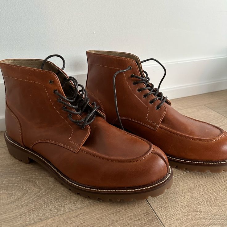 Never Worn. Brown Leather Lace-Up Boot. Dark Brown Laces. Brown Casual Moc Toe Dress Shoes, Casual Leather Moc Toe Dress Shoes, Masculine Brown Moc Toe Dress Shoes, Casual Leather Dress Shoes With Moc Toe, Brown Moc Toe Dress Shoes With Stitched Sole, Casual Goodyear Welted Moc Toe Leather Shoes, Brown Casual Chukka Boots With Goodyear Welt, Casual Brown Boots With Goodyear Welted, Casual Cognac Boots With Almond Toe