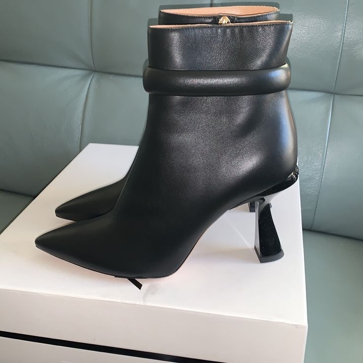 Color: Black True To Size Size: 9.5b / 39.5eu Luxury High Ankle Boots With Sculpted Heel, Luxury Ankle Boots With 4-inch Heel, Luxury Ankle-high Boots With 4-inch Heel, High Ankle Heels With Sculpted Heel For Evening, Elegant High Ankle Heels With Reinforced Heel, Formal High Ankle Heels With Sculpted Heel, Elegant Evening Heeled Boots With High Ankle, Luxury Pointed Toe Heeled Boots With 4-inch Heel, Evening Heeled Boots With 4-inch Pointed Toe