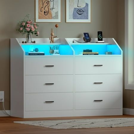 two white drawers with blue lights on them