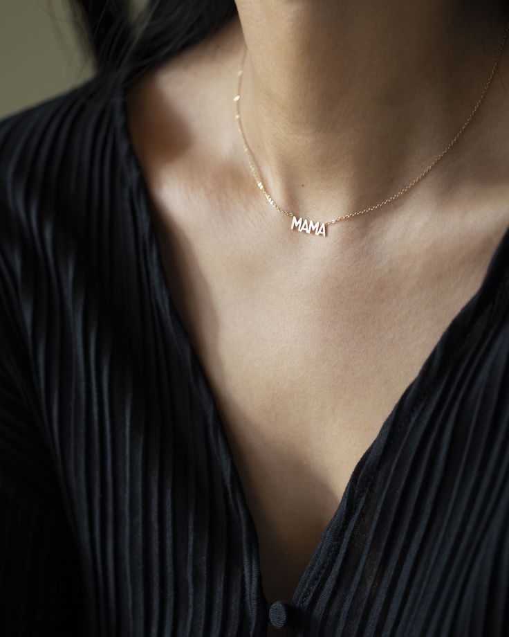 In celebration of all the great mothers around the world, treat the mom in your life to this piece of jewelry they deserve with this gold mama necklace. A perfect way to express what means most to you! Available in 14K yellow, rose or white gold Letters measure about 5mm in height Necklace total length is measured from end to end Dainty minimalist everyday necklace Rose Gold Charm Necklace Gift For Mom, Rose Gold Name Necklace With Delicate Chain, Delicate Chain Rose Gold Name Necklace, Dainty 14k Gold Name Necklace For Mom, Everyday 14k Gold Necklace For Mother's Day, Everyday 14k Gold Name Necklace, Mother's Day 14k Gold Name Necklace With Delicate Chain, Rose Gold Charm Necklace For Mother's Day, Meaningful Gold Necklaces As Gift For Mom