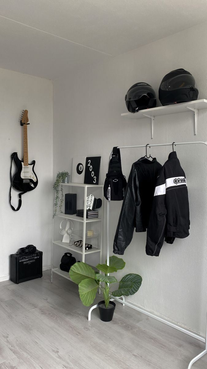 a room that has some clothes hanging on the wall