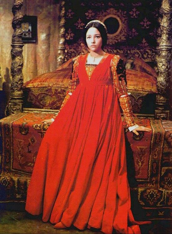 https://flic.kr/p/e23CCh | Red | The incredible Olivia Hussey in Franco Zeffirelli's Romeo & Juliet, 1968. The dress is a Danilo Donati design to represent the 1460s.  Searching through stuff to research my PowerPoint lectures I ran across some really interesting items online that were all red, like the purple things I found yesterday. I am sharing them with you all. Romeo And Juliet 1968, Romeo And Juliet Costumes, Zeffirelli Romeo And Juliet, Juliet 1968, Juliet Capulet, Leonard Whiting, Olivia Hussey, Period Outfit, Costume Drama