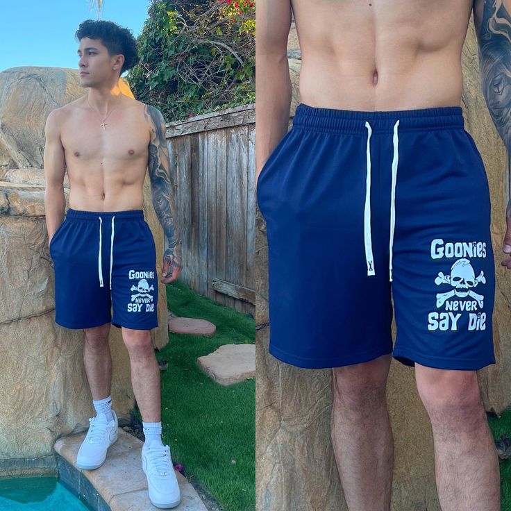 Navy Blue Goonies Sweat Shorts 💀 with "Never Say Die" design, stretch waistband, white drawstring, and dual side pockets. Made of extra soft, breathable fabric. To preserve quality of this product, avoid heat on design. Made of 100% Polyester. Return Policy: 14 day money back guarantee on all items if item doesn't fit. Trying on an item for fit is allowed. As long as item is not damage, free return shipping is included. See returns and exchanges policy for exceptions and details. For questions Goonies, Sweat Shorts, On Design, Breathable Fabric, Return Policy, Navy Blue, Heat, Money, Navy