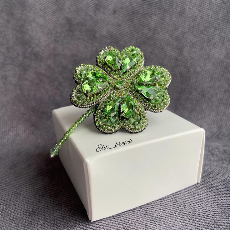 A clover brooch is a unique accessory perfect for your coat, sweater, lapel jacket, blouse collar, dress, scarf. You can wear it every day and for a solemn event. Letter decoration is a very good option for a gift. Brooch size 5x5 cm. The brooch is embroidered with my hands from quality materials: glass rhinestones (China); Indian threads; Japanese and Czech beads; glass beads; rhinestone chain (China); Italian sequins; genuine leather, fastened with a Japanese pin. I make a brooch to order. The Clover Brooch, Blouse Collar, Dress Scarf, Jacket Blouse, Letter Decoration, Lapel Jacket, Rhinestone Chain, Pin I, Brooches Handmade