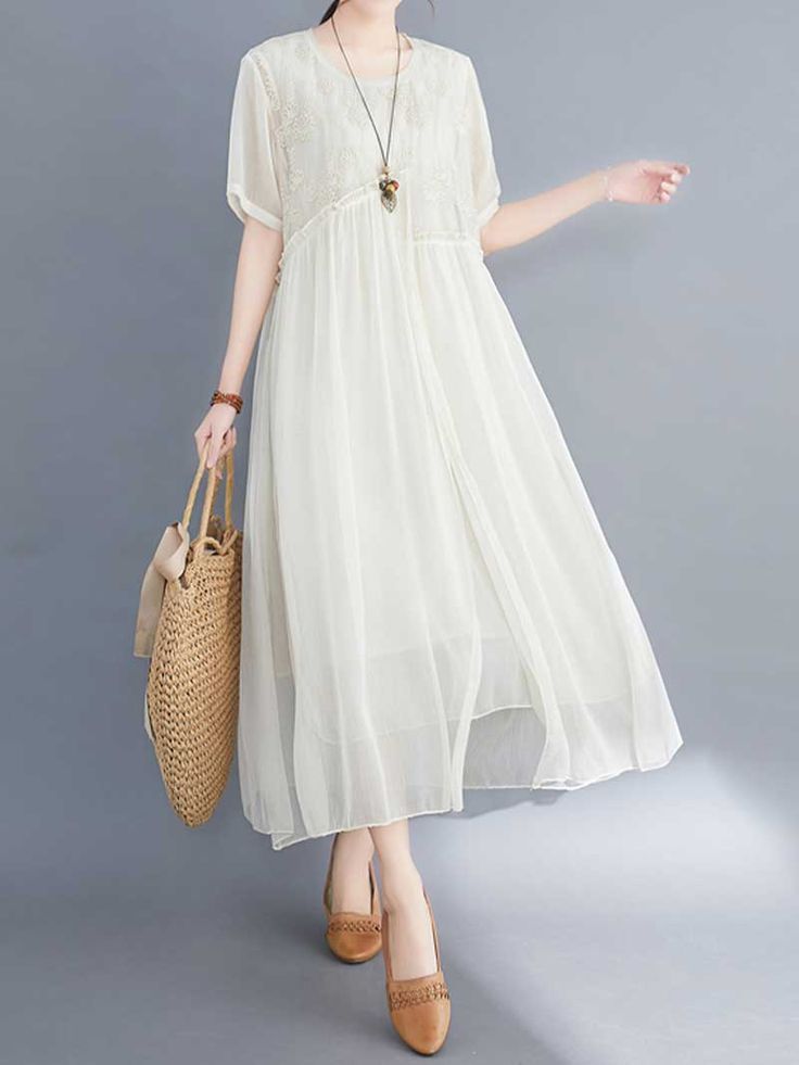 This Embroidered Silk Round-Neck A-Line Dress is the perfect choice for a summer or spring day. Made of 51% to 70% silk. it is lightweight and comfortable to wear. The round neck and regular sleeve length make it easy to style for any occasion. The embroidered detail adds a touch of elegance. The dress is available in black. apricot. white. pink. and lake-green. Size Details: CM TO INCFit For ( XS / S / M / L ) Length 119 Bust 106 Shoulder 39 Sleeve 22 Length 120 Bust 110 Shoulder 40 Sleeve 23 Length 121 Bust 114 Shoulder 41 Sleeve 24 Length 122 Bust 118 Shoulder 42 Sleeve 25 Silk Dresses Short, Dresses Short Sleeve, Silk Dress Short, Silk Dresses, Grunge Vintage, Floral Embroidered Dress, Asymmetrical Design, Spring Day, Dresses Short