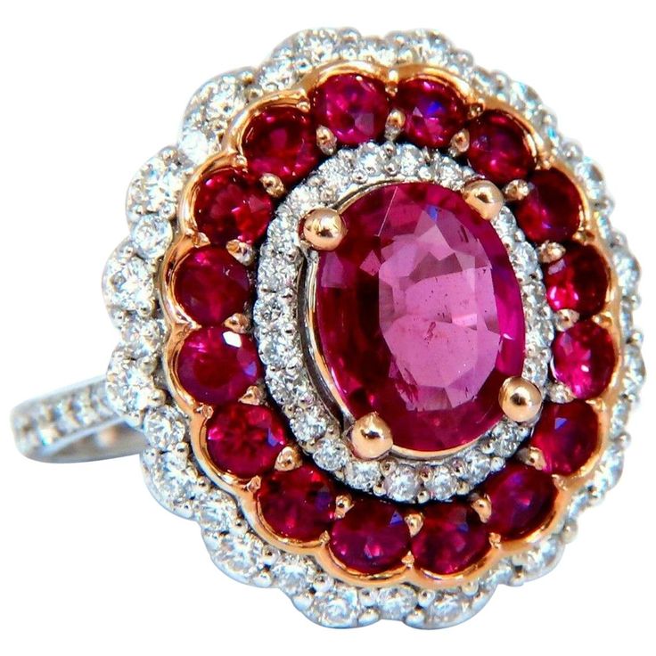 GIA Certified 1.50Ct Natural Ruby Ring Report: 5191792586 Oval cut Clean Clarity 8.28 X 6.49 X 2.87mm GIA: Purplish Red No Heat / Fully Natural 1.50ct. side round diamonds. G-color vs-2 clarity. Additional: 1.06ct Natural Round Ruby Accents. 14kt. white gold 6.6 Grams. Rings Size: 7 can be resized, please inquire first. Deck of ring: 19.3 x 17.7mm $38,000 Appraisal & GIA Report to accompany. Luxury Gia Certified Pink Ruby Ring, Luxury Gia Certified Oval Ruby Ring, Royal Blue Sapphire Ring, Antique Ruby Ring, Ballerina Ring, Natural Ruby Ring, Ruby Ring Gold, Asscher Diamond, Diamond Cluster Earrings