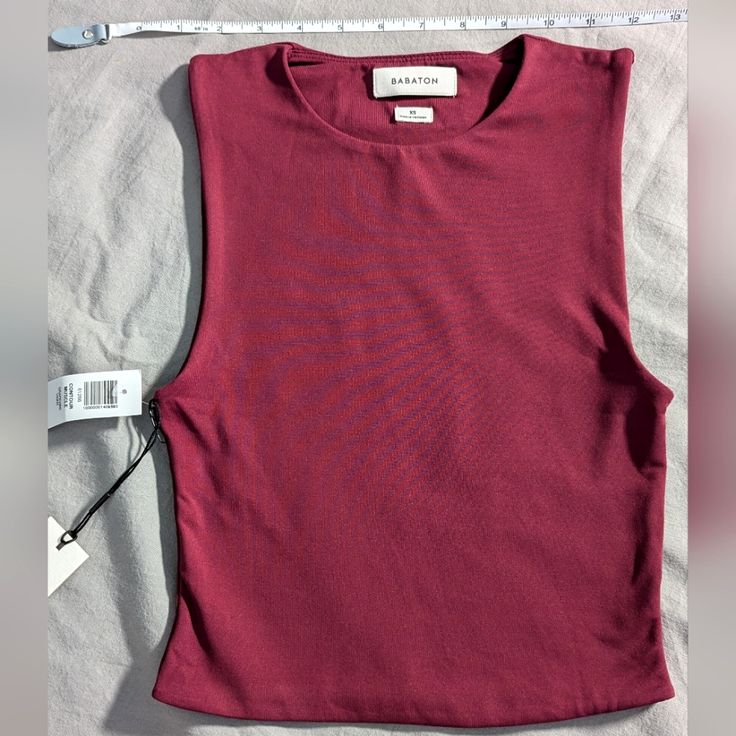 Tank With A High Crew Neckline And Double-Layer Fabric For A Smooth And Structured Fit Never Worn, Burgundy Wine Muscle Tank Top. Very Soft And Stretchy. Irons Well. 12" Across Chest 16" Length Shoulder To Hem Content: 94% Nylon, 6% Elastane Purple Fitted Sleeveless Top, Fitted Sleeveless Purple Top, Purple Fitted Cropped Tank Top, Fitted Cropped Purple Tank Top, Fitted Purple Cropped Tank Top, Chic Purple Sleeveless Crop Top, Blue Cami, Black Cami Top, Small Tank Tops