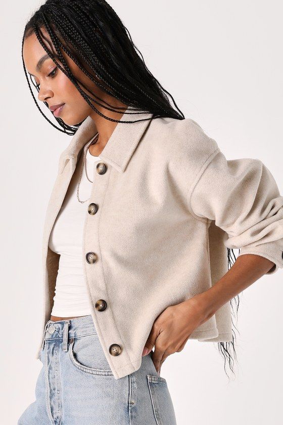 Stay snuggled up in style this winter with the cozy and cool design of the Lulus Comfy Essence Beige Cropped Shacket! This always-trendy shacket features a brushed wool-like fabrication that shapes a classic collared neckline and long sleeves with drop shoulders and button cuffs. The boxy, cropped silhouette boasts a functional button placket that runs down the center. Fit: This garment fits true to size. Length: Size medium measures 21" from shoulder to hem. Bust: Great for any cup size. Waist: Everyday Soft Knit Button-up Outerwear, Chic Collared Sweater For Fall, Chic Collared Fall Sweater, Cozy Outerwear With Soft Texture For Fall, Cozy Winter White Outerwear For Everyday, Soft Texture Outerwear For Fall, Trendy Cream Soft Knit Outerwear, Winter Beige Shacket With Long Sleeves, Fall Outerwear With Soft Texture For Everyday