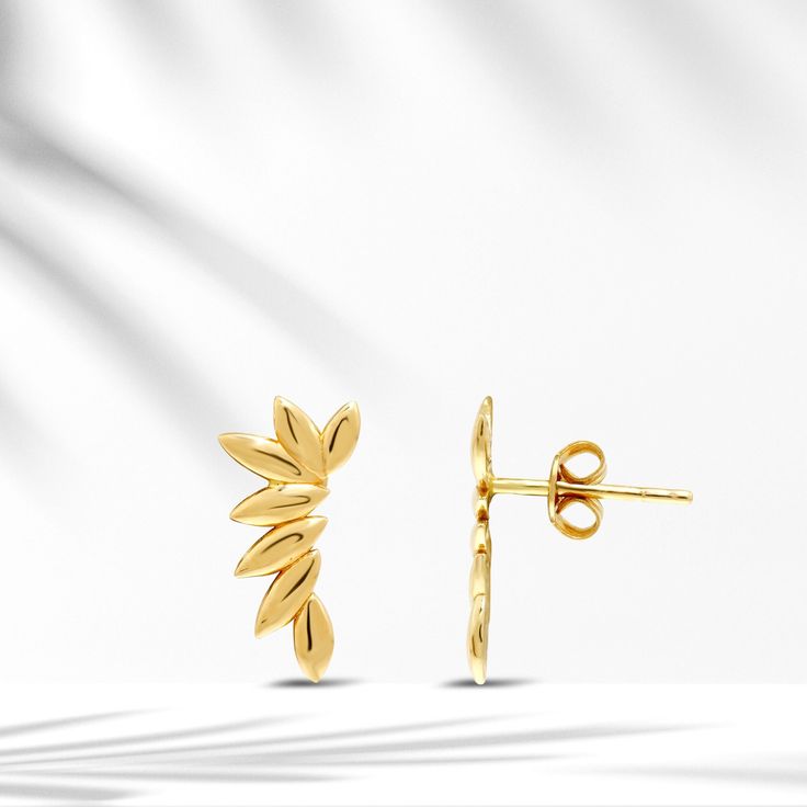 🌿 8k/14k/18k Solid Gold Laurel Earrings,Minimal Branch Cartilage Earring,Tiny Leaves Helix Stud,Conch Earring,Leaf Tragus Flat Back Earring 🌿 It is a perfect Valentine's Day gift, anniversary gift, gift for a woman, a gift for a grandmother. 🌿May laurel leaves be the decoration of your ears. 🌿  Details of the Product: Weight: Approximately 1,60 gr - Earrings are complementary pieces that transform plain looks into stylish combinations.  - All of our products are handmade produced of 8K, 14K, 18K real gold. The certificates of the diamonds we use in our products will be delivered by the cargo together with your orders. - Make sure you choose the right size and color before completing your order. If there is a preference you want to change, please contact us via message before your order Dainty Yellow Gold Ear Climbers Gift, 14k Gold Ear Climbers For Gift, 14k Gold Ear Climbers As Gift, Yellow Gold-plated Ear Climbers As Gift, Yellow Gold Plated Ear Climbers As Gift, Gold Plated Yellow Gold Ear Climbers As Gift, Gold Plated Yellow Gold Ear Climbers For Gift, Delicate Gold Pierced Ear Climbers, Delicate Gold Ear Climbers