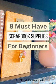 books on a shelf with the title 8 must have scrapbook supplies for beginners