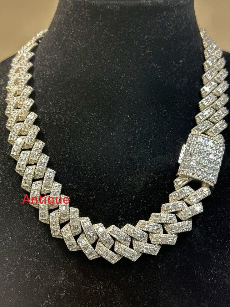 Men's Miami Cuban Link Chain Necklace Cuban Chain, Iced Necklace, CZ Diamond Choker SIlver iced Cuban Chain Mens Chain Personalize:Yes ✥ O T H E R ∙ I N F O R M A T I O N ✥ ♦ Due to every item in our shop is made to order we are open for moderate customization on demand. Contact us prior to the order. ♦ Your item will be nicely packed to gift in elegant jewelry boxes. ♦ The jewelry Certificate will be sent separately if demanded prior to the order. Contact us for more details. ✥ T U R N ∙ A R O U N D ∙ T I M E ✥ ♦ Our turnaround time is about 6 days for the given design and finish or from 7 to 10 business days for custom-made designs. This can change during peak seasons. ✥ If you can't find the information you need or need some advice for your design, feel free to contact us. We are eagerl White Iced Out Chain Link Jewelry, White Iced Out Chain Link Necklace, Iced Out White Chain Link Jewelry, Iced Out Cuban Link Diamond Necklace In White Gold, White Iced Out Cuban Link Necklace, Elegant Iced Cuban Link Jewelry, Iced Out White Cuban Link Necklace, Luxury White Cuban Link Necklace, Silver Cuban Link Necklace With Bling