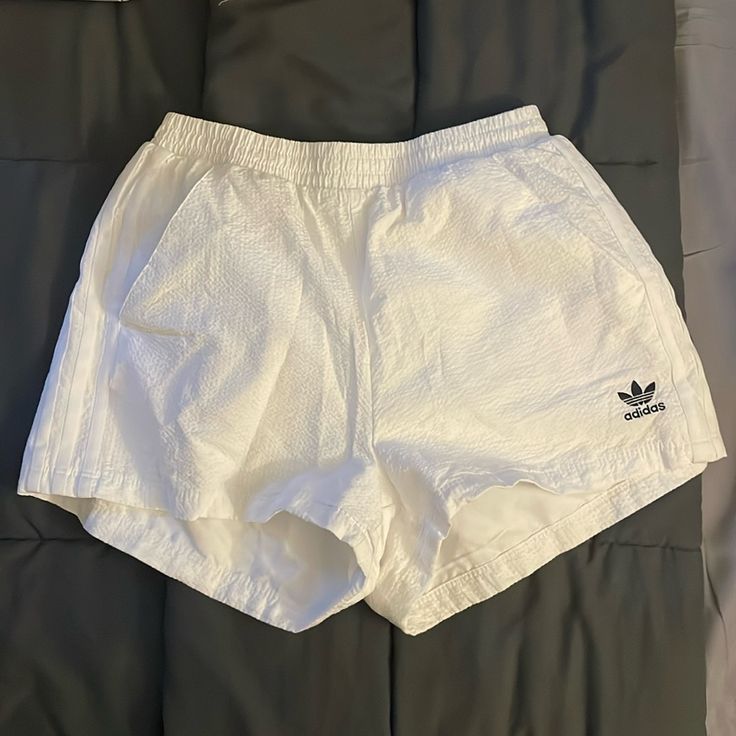 New Without Tags. 100% Cotton Shell. Three Stripe Detail On The Side. I Love These But By The Time Summer Came I Had Grown Out Of Them. They Are A Bright True White With Black Logo. Us Size Small. Please Note There Is No Stretch Other Than The Waist Band. Adidas Cotton Bottoms With Built-in Shorts, Adidas Spring Shorts With Elastic Waistband, Adidas Summer Shorts With Elastic Waistband, Adidas Spring Shorts, Adidas Elastic Waistband Summer Shorts, Sporty Adidas Bottoms For Summer, Adidas Summer Streetwear Shorts, Adidas Streetwear Shorts For Summer, Sporty Summer Adidas Bottoms