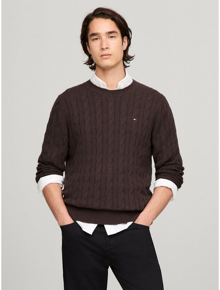 Tommy Hilfiger men's sweater. Made from soft cotton in a textured cable knit weave, this crewneck sweater is the perfect layer, complete with rib-knit cuffs, collar and hem with touches of subtle branding throughout.  Material: 100% Cotton. Classic Cable Knit Crew Neck Sweater, Brown Cable Knit Crew Neck Sweater, Classic Brown Cable Knit Sweater, Classic Brown Ribbed Sweater, Tommy Hilfiger Sweater With Ribbed Cuffs For Fall, Tommy Hilfiger Fall Sweater With Ribbed Cuffs, Classic Cotton Cable Knit Sweater, Brown Cotton Cable Knit Sweater, Brown Cable Knit Cotton Sweater