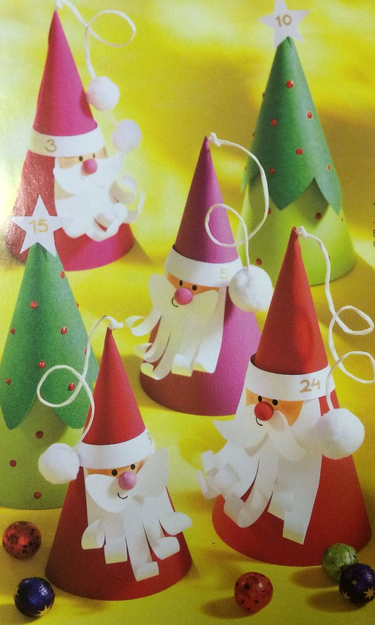 paper christmas trees with santa claus and other decorations